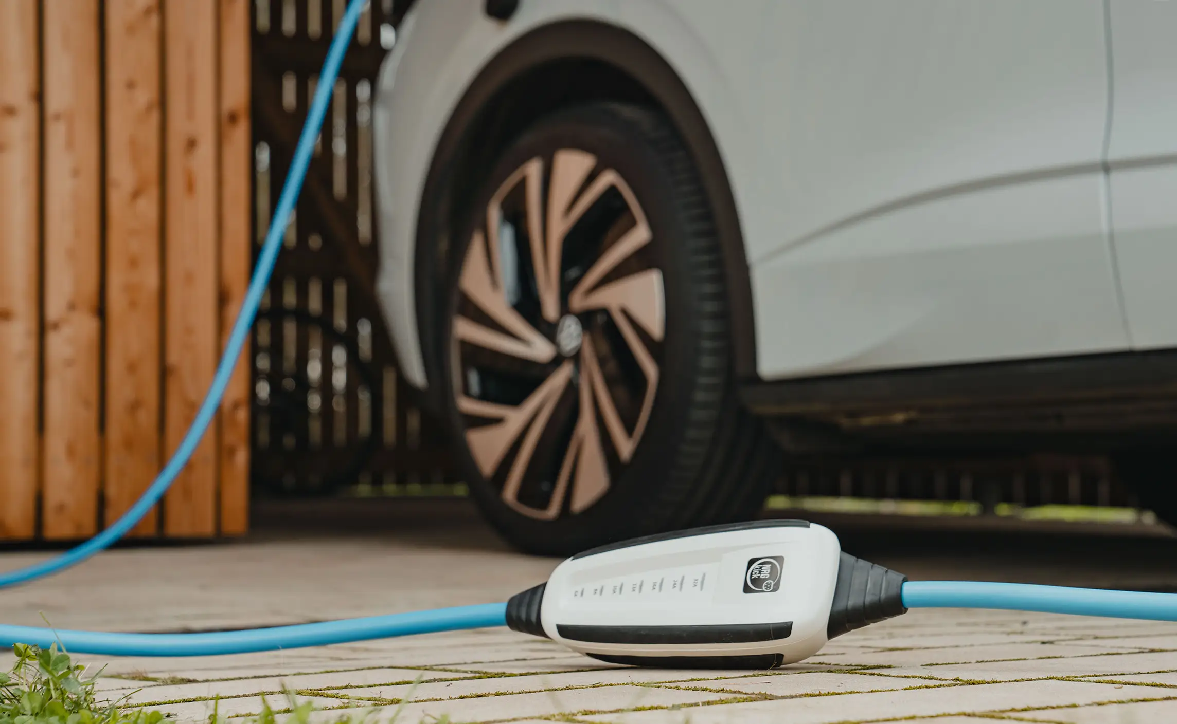 E-car is charged with NRGkick.